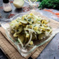 Салат из маринованных огурцов с луком
