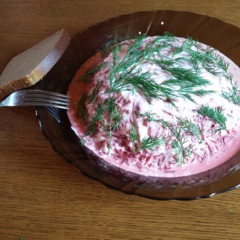 Sprats under a fur coat with pearl barley