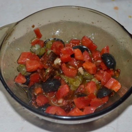 1. Stage. Broccoli Salad Nicoise: Combine mustard, olive oil, lemon juice, garlic through a press, add pepper and salt to taste. Add bell peppers, olives, anchovies and capers to the dressing. Mix well.