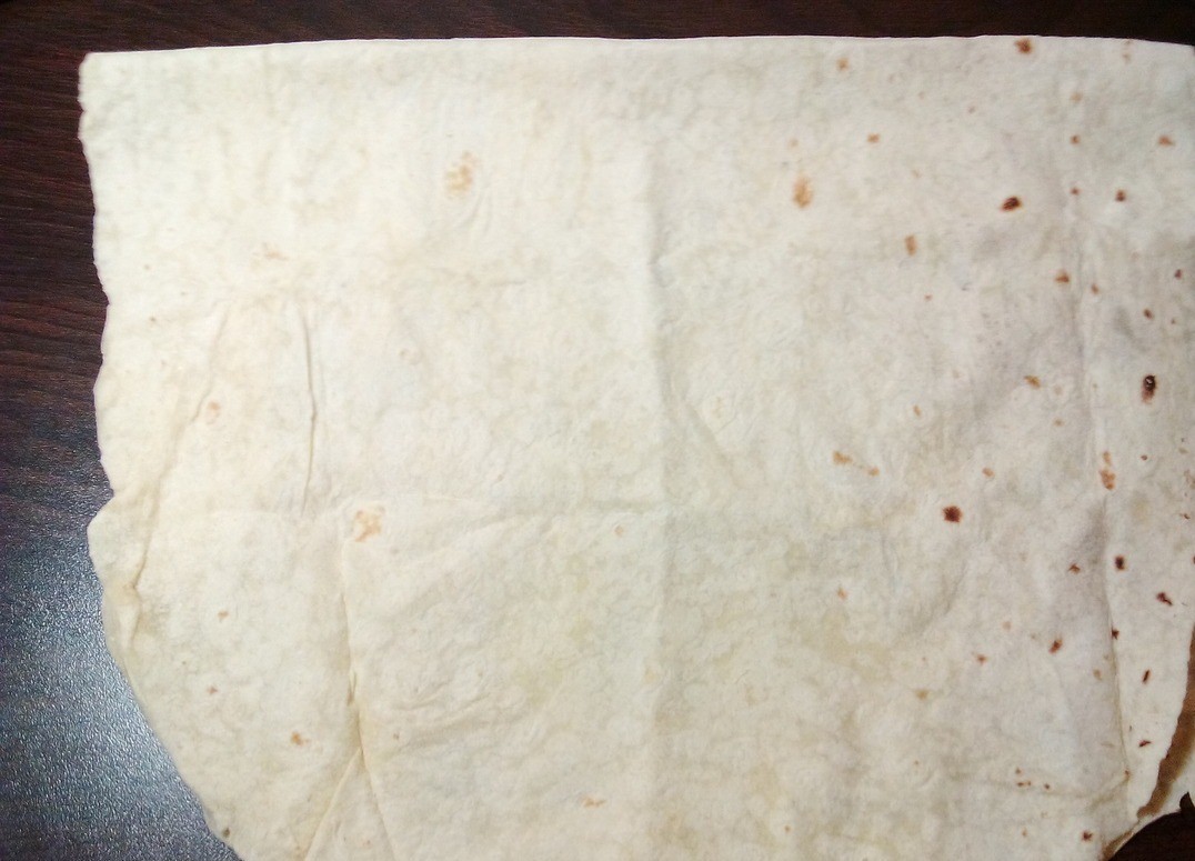 1. Stage. Lavash rolls: Fold the pita in half.