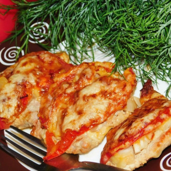 Свиные отбивные с овощами под сыром в духовке