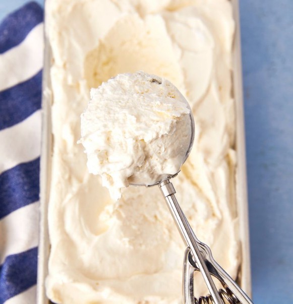 1. Stage. Ice Cream: Fold whipped coconut into whipped cream, then transfer mixture into a loaf pan.  Freeze until solid, about 5 hours.