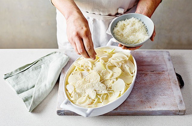 1. Stage. Potato dauphinoise: Pour over the infused milk and scatter over the cheese. The cream mixture should come to just below the potato. Swap the cheese if you like: Roquefort will add a punchy flavour, while mozzarella will add gooeyness.