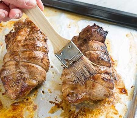 1. Stage. Baked turkey thigh: Transfer meat to a baking sheet and bake at 200 degrees for 40-60 minutes, depending on the size of the meat. The readiness of the meat can be checked by piercing it, the juice from the turkey should be transparent. 5 minutes before cooking, grease the hips with glaze, just mix everything.