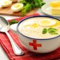 Суп для выздоравливающих больных Для начала готовим куриный бульон. Вы можете брать любые части курицы, которые нравятся. Я очень люблю готовить бульон из куриных спинок. Там и мясо есть, и косточки для навара. Спинку куриную промойте, морковь очистите, луковицу сполосните и оставьте в шелухе. В кастрюлю положите куриную спинку, луковицу, морковь, налейте холодную воду и поставьте на плиту. Как только вода закипит - снимите пену. Переключите бульон на минимальный огонь и варите при самом тихом кипении около 40-60 минут. За 15 минут до конца варки добавьте соль по вкусу Лук и морковь удалите из бульона, бульон процедите, срежьте с куриной спинки мясо. В сотейнике разогрейте масло, добавьте нарезанные произвольно лук и морковь и слегка пассеруйте их до прозрачности лука. Рис для супа лучше брать круглозёрный. Он более нежный на вкус и для супа-пюре подходит лучше всего. Я выбрала рис