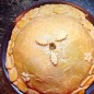 Курник Для начала приготовим тесто. Для Курника можно использовать песочное, дрожжевое тесто, и вообще любое ваше любимое. Мне нравится именно с песочным, кроме того, у меня есть любимый, идеальный для меня, рецепт. Очень холодное сливочное масло я перетираю в крошку с мукой в блендере, затем добавляю немного водуы, еще немного смешиваю в блендере, затем выкладываю все на стол и быстро собираю тесто в шар, при необходимости еще добавляя воду. Тесто готово. Кладу его на 30 мин в холод. Я тесто и начинку готовлю накануне вечером, а утром собираю пирог, в таком случае тесто надо достать из холода за 30 мин, перед началом работы с ним. Следующим шагом будет приготовления блинчиков. У каждого есть свой любимый рецепт блинов, я не навязываю Вам конкретно этот, здесь подойдут абсолютно любые тонкие блинчики. Мой очень простой. Я использую шейкер, взбиваю в нем яйцо, молоко, соль. Далее добавляю муку и еще раз взбиваю, в конце добавляю растительное масло, зелень и перемешиваю до однородности. Осталось только испечь блинчики. Осталось только приготовить начинки, как я писала ранее, делаю их накануне вечером. Начнем с куриной. Курицу отварить, нарезать мелко, смешать с зеленью. Бульон оставить, он нам еще пригодится. Теперь грибная начинка. Грибы обжарить с луком. Гречку отварить в курином бульоне, смешать с грибами и луком. если вы гречку будете варить в воде, то не забудьте посолить, у меня бульон уже был достаточно соленый. С яйцами совсем все просто, их надо отварить и мелко порубить. Готово! Дело осталось за малым! Собираем Курник! Песочное тесто делим на две части, одна чуть больше другой. Меньшую часть тонко раскатываем в круг, делать это надо сразу на пергаменте, присыпав мукой. Выкладываем на тесто блин, сверху куриную начинку, опять блин, грибную начинку, блин, яичную начинку, блин. Я вот сверху два блинчика положила. Накрываем сверху раскатанной второй частью теста, в центре делаем отверстие, смазываем яичным желтком, украшаем по желанию. Ставим в заранее разогретую до 180 градусов духовку, на 30 минут. Конечно по времени ориентируйтесь на свою духовку.
