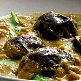 1. Этап. Мини-баклажаны: Подавайте тёплым и украшенным листьями кориандра. Приятного аппетита.