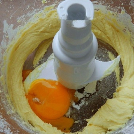 1. Stage. Cheese crackers: Then add the yolk and whisk again.