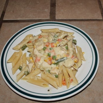 Курица в сметане с овощами