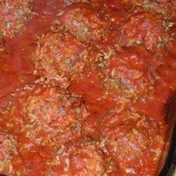 1. Stage. Oven meatballs: Put in a baking dish, combine the tomato sauce and 1 cup of water. Place the fried meatballs in tomato sauce, turning to coat well.