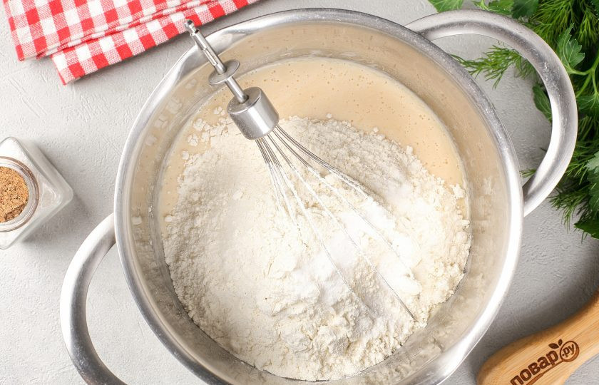 1. Этап. Лепёшки сырные на ряженке: Затем добавьте 250 грамм муки и соду.