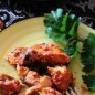Рыба с миндалем Продукты. У меня был кусок филе форели, но можно готовить и из другой рыбы. Так как кусок филе у меня был с кожей, то первым делом я срезала мясо с кожи (это просто, главное иметь острый нож), нарезала поперек кусками толщиной в три см. Поперчила и посолила, хорошенько распределила соль и паприку по всем кускам, и отправила на 15 - 20 минут в холодильник. Пока рыба в холодильнике, включила духовку (ее надо разогреть до 240 град), изюм, подержав предварительно 10 минут в кипятке, нарезала мелко, орехи мелко измельчила блендером, помидор, освободила от кожицы, обдав кипятком и с помощью блендера превратила в пюре (можно не очищать от кожицы и потереть на терке). На сковороде разогрела масло, добавила измельченные миндаль и изюм, помешивая, подержала их в масле 2- 3 минуты. Затем в сковороду вылила томатную массу, перемешала и оставила томиться на средне-слабом огне 10 минут. Переодически помешивала. Добавила щепотку соли (надо учитывать, что рыбу уже солили) и щепотку острого перца, перемешала и прогрела все еще пару минут. Достала куски рыбы из холодильника и уложила плотно в подходящую по размеру жаропрочную форму, предварительно смазав ее растительным маслом. И отправила в нагретую до 240 град. духовку до образования легкой корочки, на 15 - 20 минут. Таким образом, обеспечивается сочность каждого кусочка. На фотографии именно рыба, которую я достала из духовки после 15-ти минутного запекания. Затем выкладываю на рыбу томатно-ореховую смесь, разравниваю и запекаю дальше, уже снизив температуру до 200 градусов, в течение 10 минут до загустения соуса. Он должен слегка запечься. Вот и готово. Можно подавать. Как же это ароматно, пряно, с легкой томатной кислинкой и остротой жгучего перца. Вкусно!
