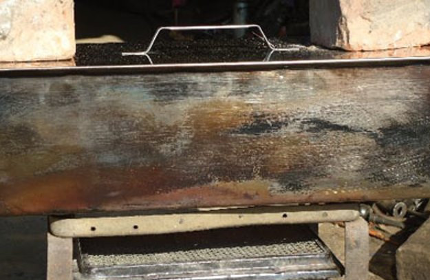 1. Этап. Ребрышки копченые: Закройте крышку и поставьте на сильный огонь на 25 минут.