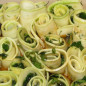 Zucchini rolls in garlic and honey sauce