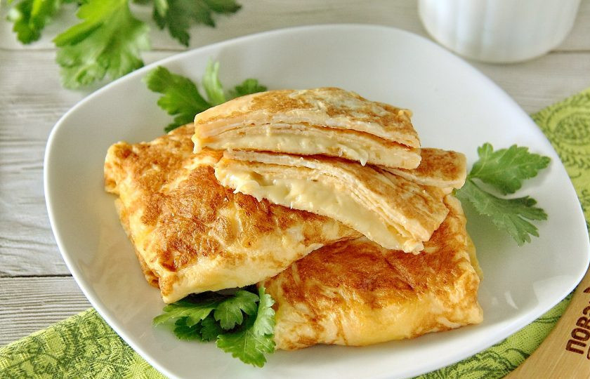 1. Этап. Яичные блины с сыром: Таким же способом приготовьте все блины и подавайте к столу. Приятного аппетита!