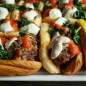 Pork Meatball Subs with Garlicky Kale