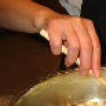 1. Этап. Капоната: В маленькой кастрюле отварить сельдерей (5-7 минут) до готовности и порезать на маленькие кусочки. В сотейнике среднего размера, влить оливковое масло, добавить лук, красный перец, чеснок и обжаривать примерно 5 минут на среднем огне.