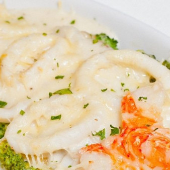 Кальмары в сметанном соусе