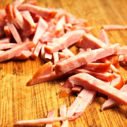 1. Этап. Салат Днестр: Брусочками нарезаем нашу колбасу.