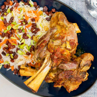 Kabuli Palao (Afghan Lamb Shanks with Rice, Carrots, and Raisins)