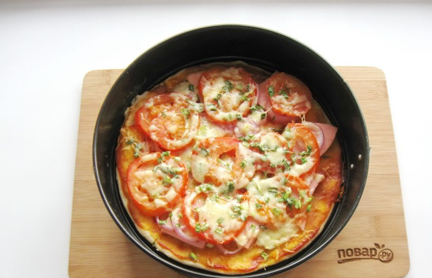 1. Этап. Самая вкусная пицца: Выпекайте пиццу в духовке при температуре 180-190 градусов 15-20 минут.