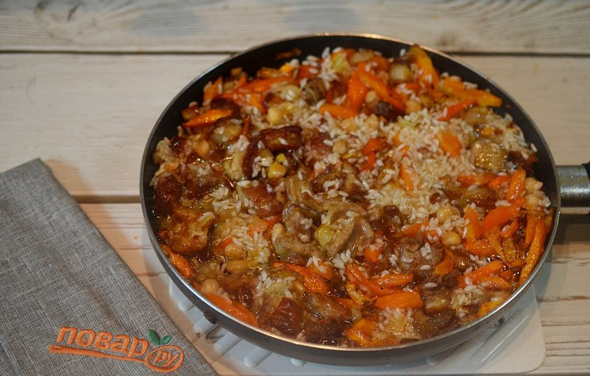 1. Этап. Оши палов: 12. Обжарьте, чтобы каждая рисинка пропиталась маслом.