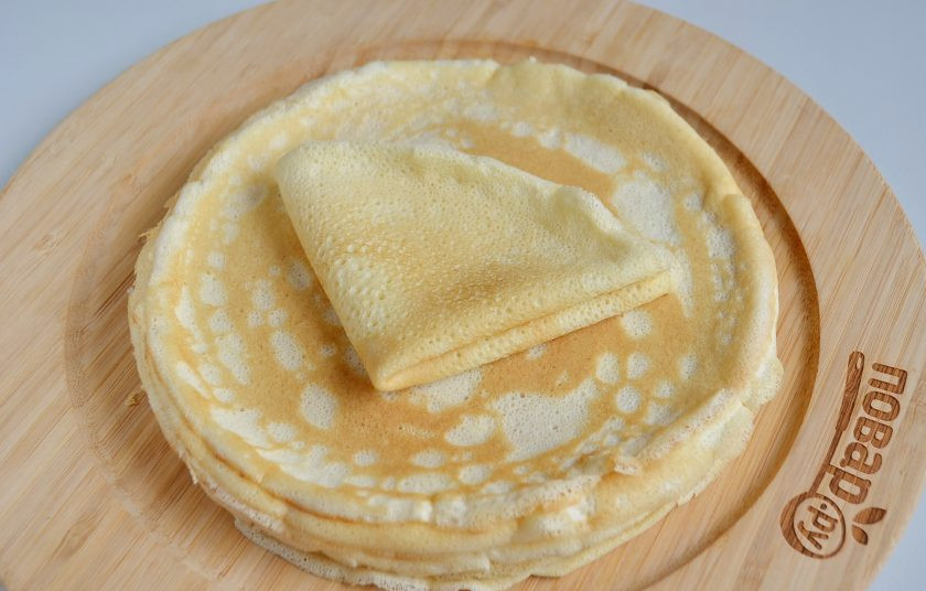 1. Этап. Креп Сюзетт (Crepe Suzette): 18. Готовые блинчики очень нежные и мягкие. Каждый блинчик сложите пополам, потом еще раз пополам. Их получается 14 штук, диаметр моей сковороды — 20 см.