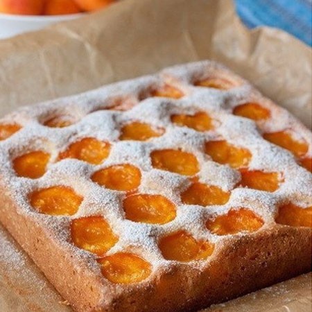 1. Stage. Apricot Sponge Cake: Bake apricot sponge cake at 180 degrees for about 40 minutes, check readiness with a toothpick. Sprinkle with powdered sugar.