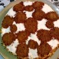 Торт Черепашка Приготовим коржи. В глубокую посуду разбиваем яйца Добавляем сахар и ванилин. Взбиваем миксером до пены, добавляем соду и растительное масло. Снова взбиваем. Добавляем постепенно муку и продолжаем взбивать. Тесто будет консистенцией густой сметаны Из получившейся массы, отбираем в отдельную посуду, 5 столовых ложек теста. Добавляем к нему какао и перемешиваем. Застилаем противень (26 см в диаметре) фольгой и выливаем 6 столовых ложек светлого теста. Выравниваем по поверхности Чайной ложкой выкладываем темное тесто, как видно по фотографии. В разогретую до 200 градусов духовку, помещаем противень на 8 минут. Так выглядит готовый корж. Всего их должно получится 4 штуки. Подготовим крем. Взбиваем миксером сметану с сахаром и загустителем. Начинаем формировать торт. Смазываем кремом каждый корж Выкладываем корж на корж. Смазываем и край кремом, потом рукой обкладываем край орехами. Трем на мелкой терке шоколад (я беру всегда пористый, так как его легче тереть) и чайной ложечкой, выкладываем рисунок в форме панциря черепахи. Так выглядит готовый торт Через два часа, торт готов к употреблению. Готовим чай режем торт. Приятного аппетита. Спасибо.