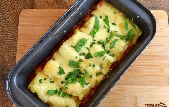 1. Этап. Рулеты из лазаньи: 5. Запекайте в разогретой до 180 духовке, до расплавления моцареллы.