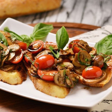 1. Stage. Bruschetta with fried mushrooms: Cut the baguette into pieces and fry in a dry pan. Put the filling on slices of bread and serve.