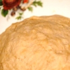 1. Этап. Постные пирожки с капустой: Получившееся тесто накрываем полотенцем и оставляем в теплом месте на 1 час.