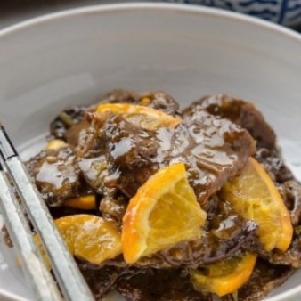 Говядина в апельсиновом соусе
