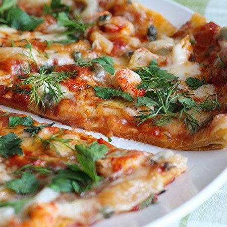 1. Stage. Seafood pizza: Bake in a preheated oven to 200 degrees 10 minutes. Sprinkle to taste any chopped herbs.