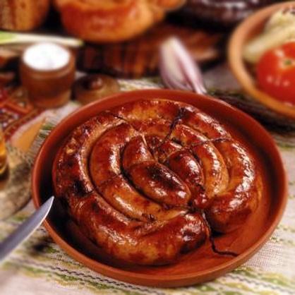 1. Stage. Home-made sausage with potatoes: Gently place the prepared sausage on a plate and serve hot.