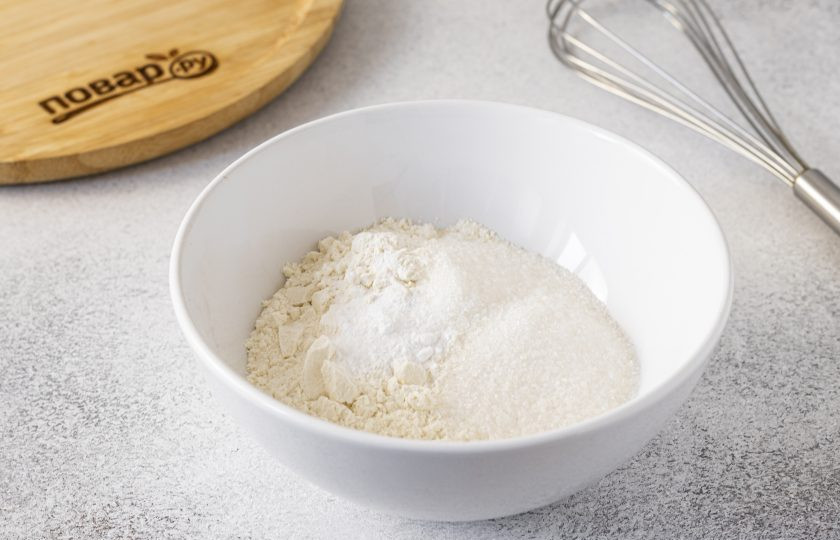 1. Этап. Печенье с семечками подсолнуха и кунжутом: Смешайте в миске муку с разрыхлителем, сахаром и солью.