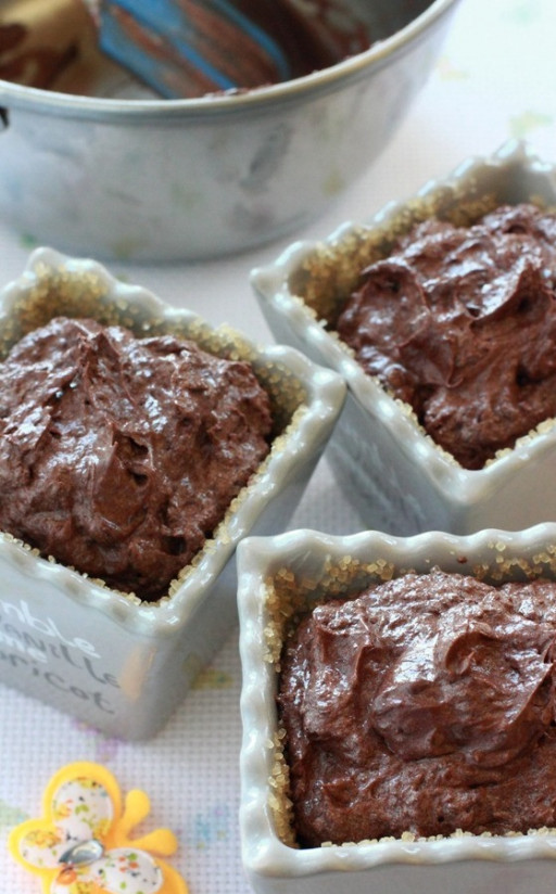 1. Stage. Warm chocolate soufflé with cherries: And cover them with the remaining half of the chocolate mousse. Put the molds in the freezer for at least 3 hours. If you store for longer (up to 2-3 days), cover the molds with clingfilm to prevent them from getting weathered and absorbing foreign odors. Bake in a preheated 200 degree oven for 10-13 minutes. Let stand for 3 minutes and only then you can take a sample. Z.U. The volume of my pots - 90 ml, besides they have thick walls and they are deep enough. The baking time is for this size. If your ramekins are smaller or larger, reduce or increase the baking time, the main thing is not to dry out the dessert. This is a case where it is better to underbake than overbake.