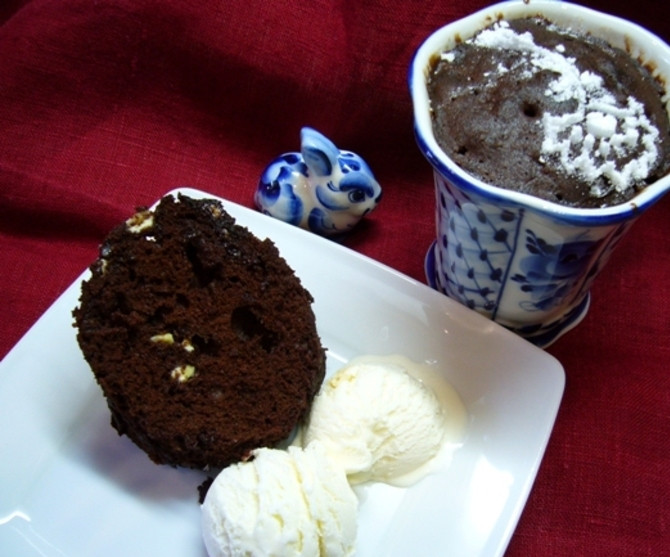 1. Этап. Кофейный кекс в микроволновке: Готовьте в микроволновке при максимальной мощности в течение двух минут. Подавайте, украсив по своему усмотрению. Приятного завтрака!