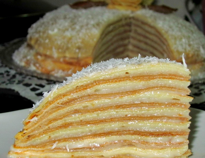 1. Этап. Блинный торт с медом: Готовый блинный торт можно посыпать по желанию тертым шоколадом, какао или кокосовой стружкой. Отправляем тортик в холодильник, чтобы крем застыл. Подавать его нужно в холодном виде с горячим чаем.