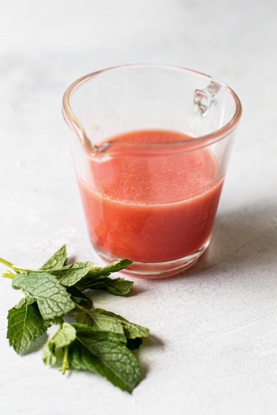 1. Stage. Watermelon Mojito: Tear the mint leaves in half and divide them between two glasses. Divide the sugar and lime juice between each glass (juice of 1/2 a lime per glass).