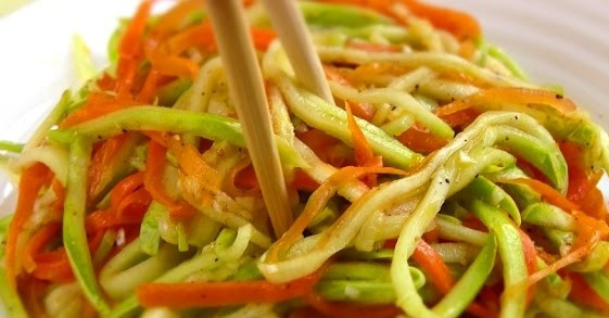 1. Этап. Салат из кабачков по-корейски: 3. Добавьте соль, сахар и перемешайте. Горячую морковь добавьте к салату, накройте его пленкой и отправьте в холодильник на 2-3 часа. Приятного аппетита!