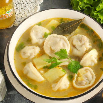 Сырный суп с пельменями