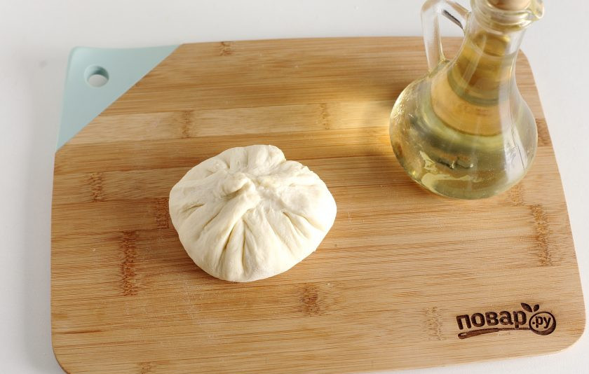 1. Этап. Хачапури на сметане: Соберите края к центру как на фото.