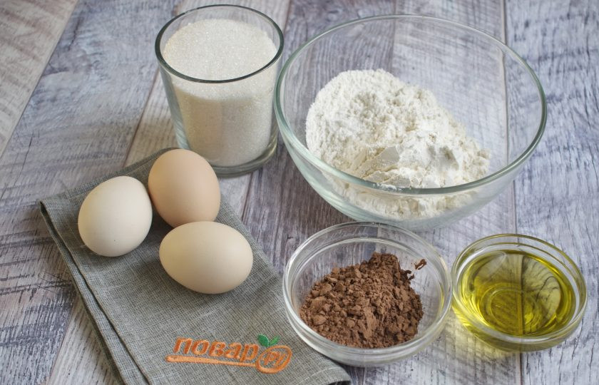 1. Этап. Шоколадные капкейки: 1. Подготовьте необходимые продукты для теста. Муку просейте в миску, соедините с какао-порошком.