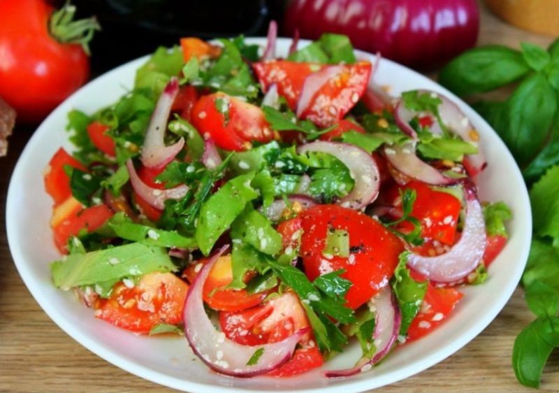 1. Stage. Tomato Salad with Red Onion: Salt, pepper, add sesame and oil. Stir and serve.