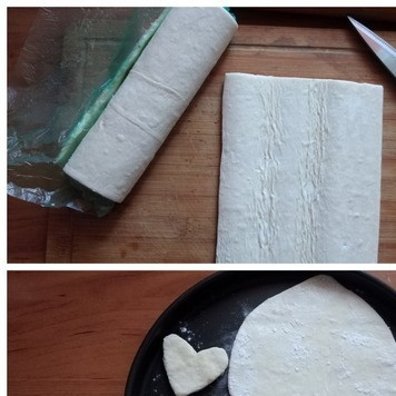 1. Этап. Сырно-яблочные слойки: Тесто нужно разморозить заранее. Раскатаем его в пласт потоньше, подпылив рабочее место немного мукой. Теперь вырезаем сердечки. Можно сделать трафарет из бумаги по размеру, который вас устроит. Я вырезала 