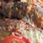 Рыба, тушеная с помидорами