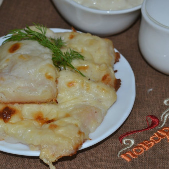 Рыба, запеченная под молочным соусом